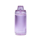 Deco Gravity Bong, a tall, ribbed, translucent glass container with matching lid, elegantly combines Art Deco design and modern performance for gravity-powered sessions.