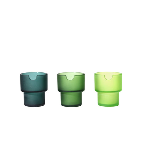 Flower Pots Ashtray Set: Three frosted-glass vessels with a cylindrical shape, featuring subtle grooves and a semicircular top notch, showcasing functional art.