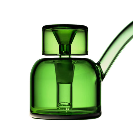 The Vesper Bubbler, a compact green-tinted glass piece, features an angled spout, internal downstem, offering both elegance and smooth, water-filtered functionality.