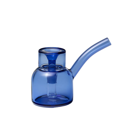 Vesper Bubbler: A translucent blue, single-chamber glass water pipe with a round base, curved mouthpiece, and detachable bowl for elegant tabletop use.