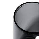 Close-up of a smoky-gray Vesper Gravity Bong, showcasing its smooth cylindrical glass design, exemplifying modern elegance and effortless functionality with gravity-powered performance.