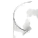 Close-up of the Vesper Gravity Bong's rim and side, showcasing its sleek, cylindrical borosilicate glass design, emphasizing elegance and effortless functionality.