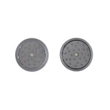 2pcs Metal 3 Magnetic Grinder close-up, featuring a circular metal surface with holes, showcasing its durable design and efficiency for herb grinding.