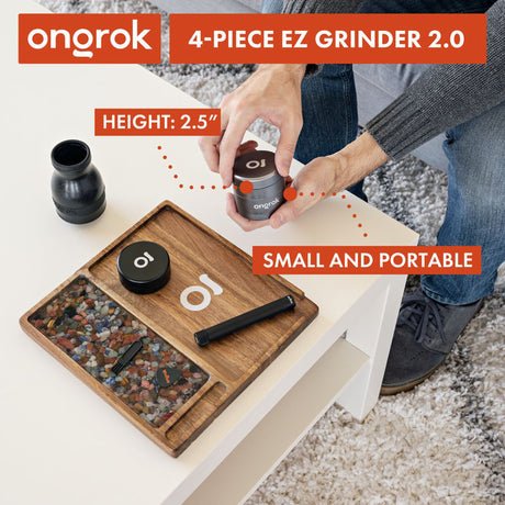 4pcs Aluminum 2.6 EZ Grinder in hand, showcasing its compact size and durable design, ideal for consistent herb grinding and convenient storage.