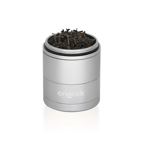 5pcs Aluminum 3 Pyramid Teeth Grinder with Storage, featuring a silver container with pyramid-shaped teeth, designed for efficient herb grinding and convenient storage.