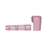 Anodized pink aluminum tube unscrewed, revealing white capsules inside, illustrating the compact design of the Aluminum and Glass Spoon Pipe for portable use.