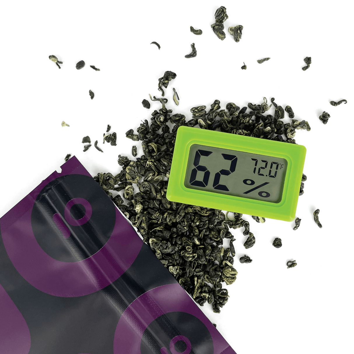 Digital Hygrometer - 6 pack with LCD screens beside green leaves, showcasing compact design for accurate temperature and humidity monitoring in storage.