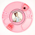 Spinning Rolling Tray: A round, pink silicone tray with multiple compartments and a central Blazy Susan logo, designed for organizing herbs, tools, and concentrates.