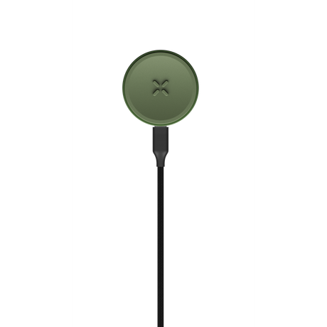 PAX FLOW magnetic Qi-style charging puck on braided cable, designed for use with the advanced dry herb vaporizer, ensuring efficient charging and portability.