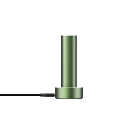 PAX FLOW vaporizer, a matte-green metal cylinder on a round base with a black braided power cable, showcasing its sleek, portable design.