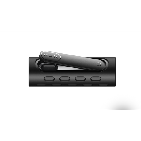 PAX FLOW black portable vaporizer in charging dock, showcasing its sleek design and compact form, highlighting advanced dry herb vaporization technology.