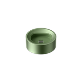PAX FLOW Charging Dock: Circular aluminum dock with a USB-C connector, designed to hold and charge PAX FLOW devices upright efficiently.