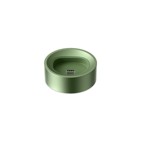 PAX FLOW Charging Dock: Circular aluminum dock with a USB-C connector, designed to hold and charge PAX FLOW devices upright efficiently.
