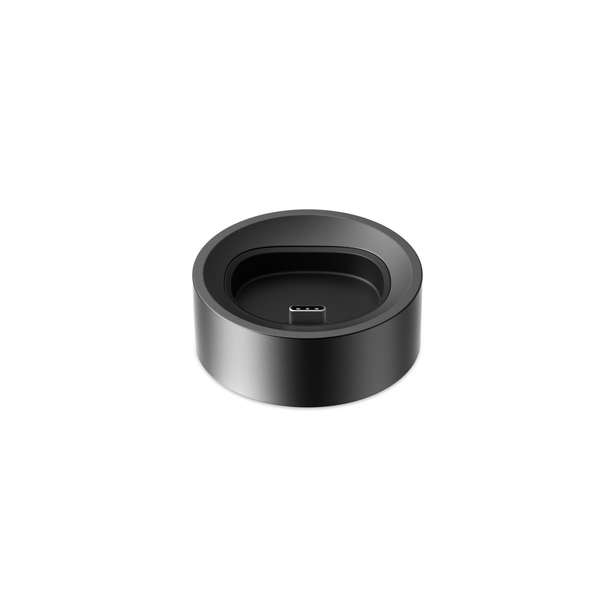 PAX FLOW Charging Dock: A sleek, matte black circular dock with USB-C plug, designed for efficient charging and organization of the PAX FLOW device.