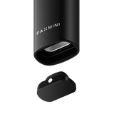 PAX Mini portable vaporizer, showing black aluminum body with logo, alongside detached magnetic mouthpiece/oven lid, highlighting compact design and intelligent heat control features.