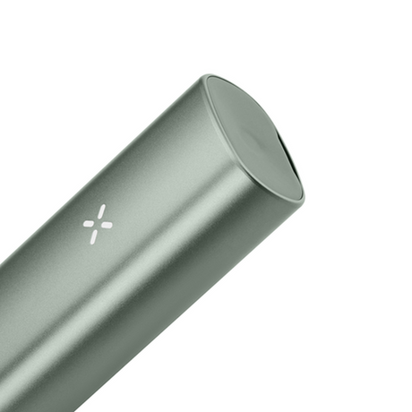 Close-up of the PAX Plus Dry Vaporizer Starter Kit, featuring a sleek silver cylinder design, highlighting its standard accessories for convenient use.