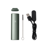 PAX Plus Dry Vaporizer Starter Kit with a green device, black cord, and earbuds, featuring mouthpieces, oven lid, screen, wire brush, and USB cable.