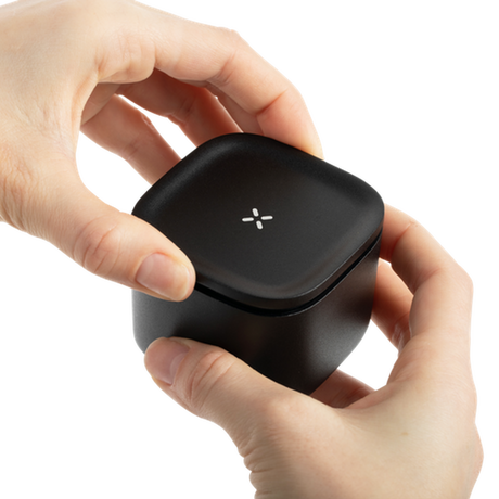 Stash Jar - Small held in hand, showcasing its compact, sleek design for discreet, smell-proof storage of herbs, made from high-quality aluminum.