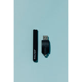 Philter 510 Thread Battery Autodraw with black finish, next to a USB charger, showcasing its sleek, buttonless design for effortless vaping.