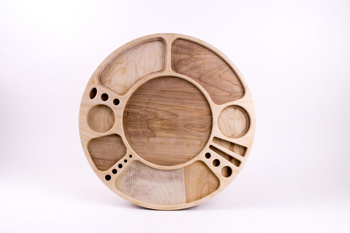 Spinning Rolling Tray with multiple carved compartments, featuring a smooth, clear-coated finish on fine-grained birch wood, designed for organized, rotating display use.