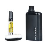 DL 2.0 PRO Auto-Draw VV 510 Battery beside oil-filled vape cartridge in charger dock, showcasing its sleek design and compatibility.