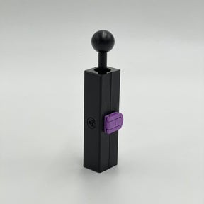 Mini CannaMold - Fits 1-2g, featuring a black rectangular form with a purple handle, designed for crafting slow-burning cannagars with integrated airflow for smooth draws.