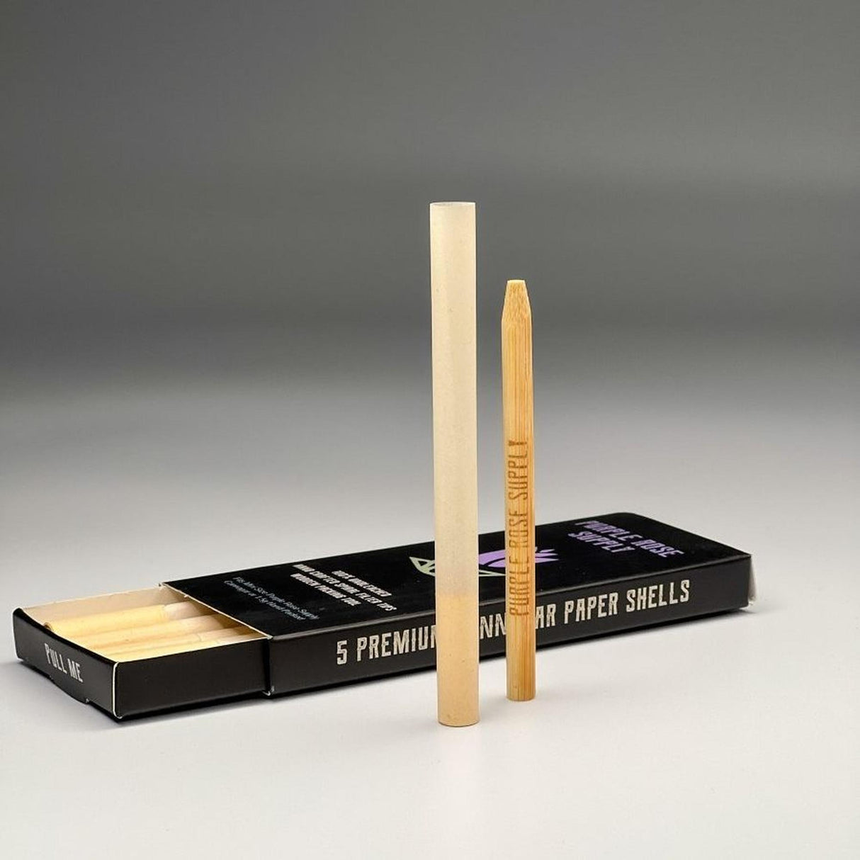 Mini Shell Cones - Carton of 20: Pre-formed paper shells in a black box, ideal for crafting premium cannagars, ensuring a slow, consistent burn.