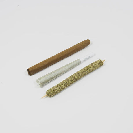 Personal CannaMold - Fits 2-4g; features multiple rolled cigarettes, emphasizing the mold's ability to create tightly packed, slow-burning cannagars for extended smoking sessions.