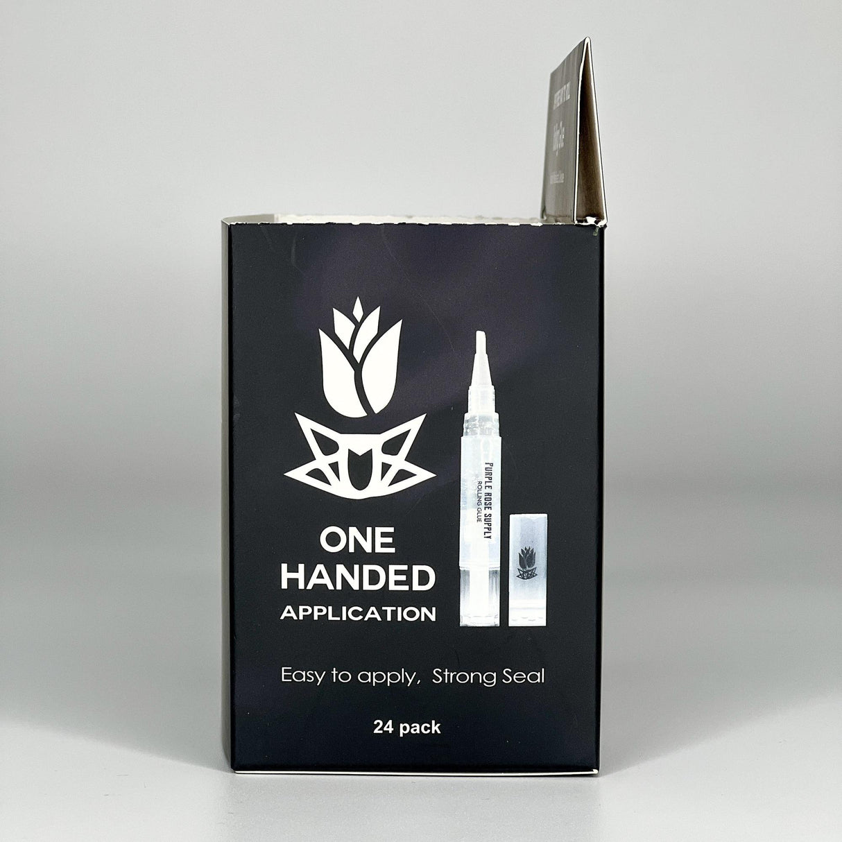Rolling Glue Box - 4 ml - Carton of 24 features a black box with white text, showcasing a hygienic, spit-free rolling solution with a built-in brush for precise application.