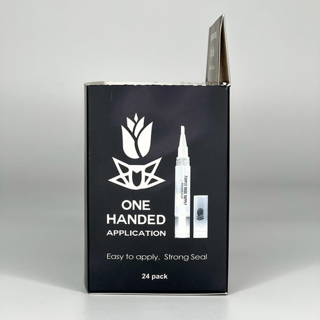 Rolling Glue Box - 4 ml - Carton of 24 features a black box with white text, showcasing a hygienic, spit-free rolling solution with a built-in brush for precise application.