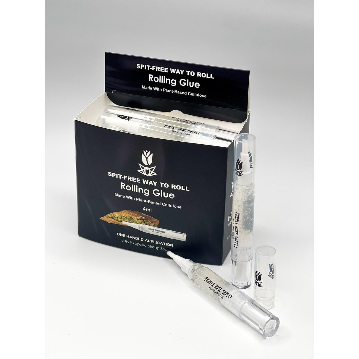 Rolling Glue Box - 4 ml - Carton of 24 with two visible glue tubes, featuring built-in brushes for precise, spit-free application, ideal for smoke shops.