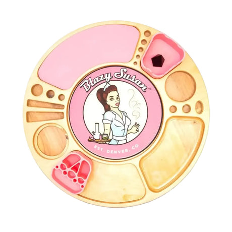 Spinning Rolling Tray with wood and pink silicone compartments, featuring the Blazy Susan logo, offers organized sections for herbs, tools, and lighter.