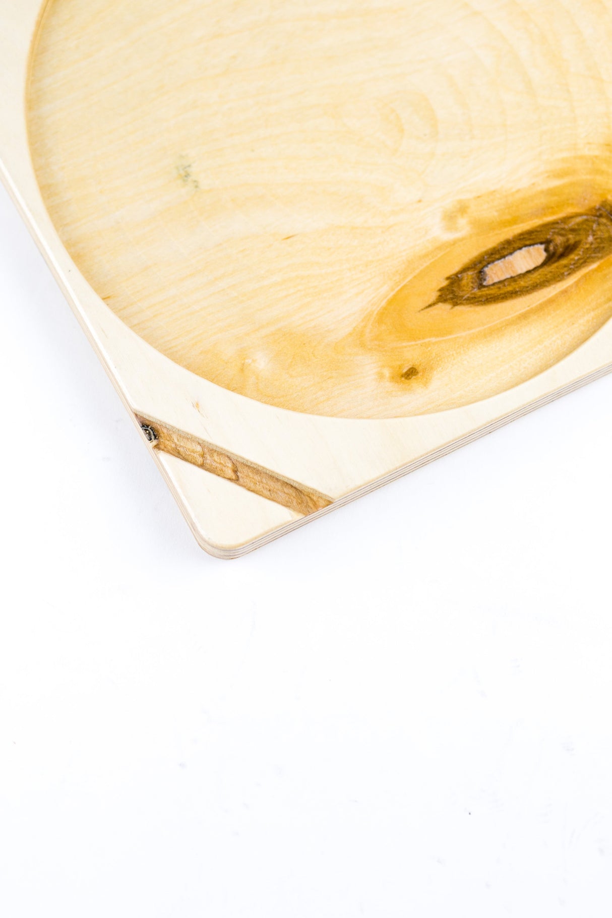 Pale birch wood Dab Tray with a shallow circular recess, showcasing a knotty grain pattern, designed for organized setups with a stylish, low-profile design.
