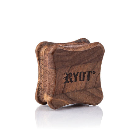 RYOT 1905 Fly Walnut Grinder with dark-grain walnut body, curved sides, stamped logo, and steel teeth, designed for compact herb storage and grinding.