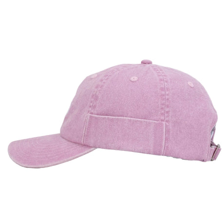 Light pink denim roller cap with a curved brim, adjustable back strap, and a side pocket