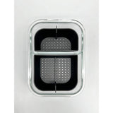 TRIBAL BANGER BASKET featuring a black and grey design, visible as a black plastic container with a grated surface.