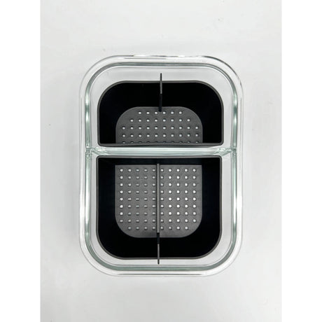 TRIBAL BANGER BASKET featuring a black and grey design, visible as a black plastic container with a grated surface.