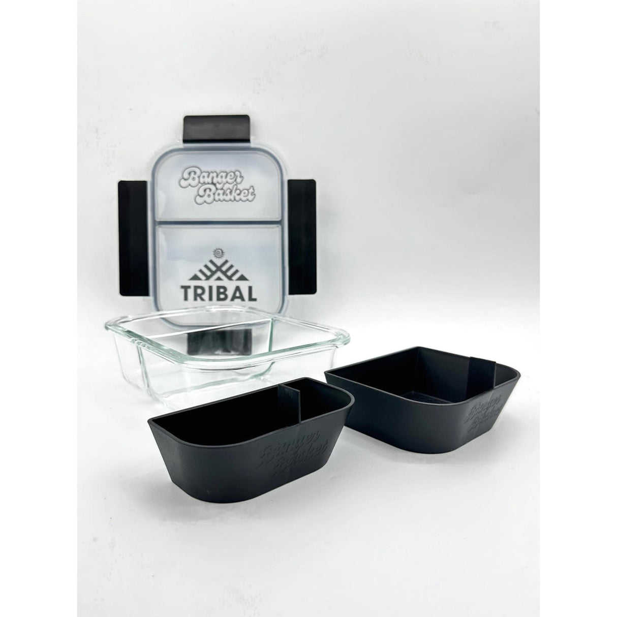 TRIBAL BANGER BASKET featuring a black square container with a logo, paired with a glass baking dish and spoon, ideal for organized storage.