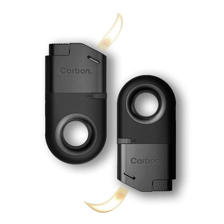 Two Carbon Inverted Lighters, featuring a circular grip, adjustable flame, and flip-up torch head, one firing, ideal for versatile use in retail settings.