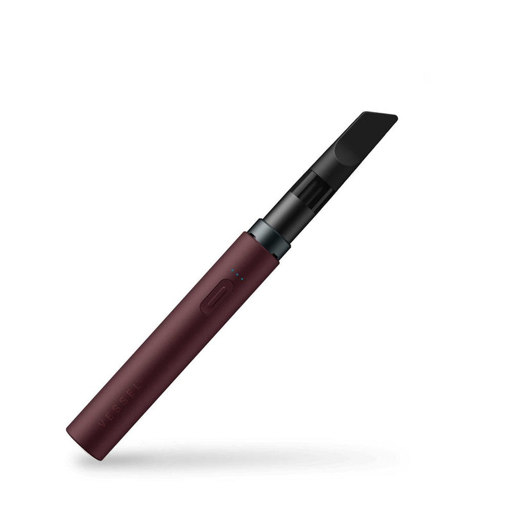 Compact Vessel Core 510 Thread Battery featuring a slanted black mouthpiece, cylindrical body with power button, LED indicators, and USB-C charging port for versatile cartridge use.