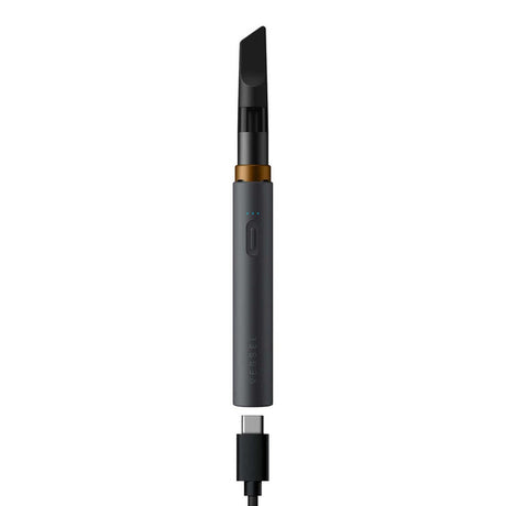 VESSEL Core 510 Thread Battery with a cylindrical design, detachable mouthpiece, gold ring, push-button, LED indicators, and USB-C charging cable connected at the base.