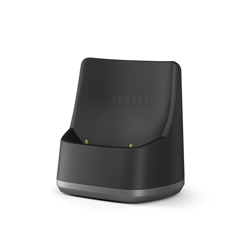 Ridge Charger - Black: Matte-black dock with VESSEL embossed, featuring gold-plated contact pins for Compass Series charging; includes 1.5m USB to USB-C cable.