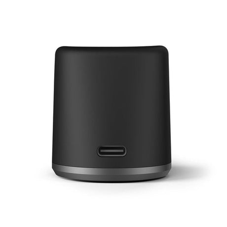 Ridge Charger - Black: Matte-black cylindrical dock with USB-C port, weighted base, and non-slip pad for stable charging and display of Compass Series devices.