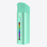 Pocket Concentrate Vaporizer: Mint-green, cylindrical vaporizer with a slanted mouthpiece, OLED display showing battery and temperature, designed for premium wax vaping with ergonomic features.