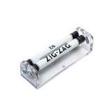 1 1/4 Rolling Machines 78 mm - Carton of 12; clear plastic device with dual rollers for efficiently packing and rolling tobacco, ensuring uniform results.