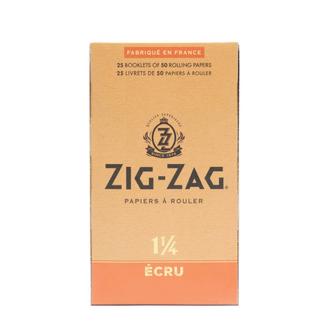 1 1/4 Unbleached Rolling Paper box, featuring Zig-Zag logo, emphasizing natural, ultra-thin, slow-burning papers for a premium smoking experience.