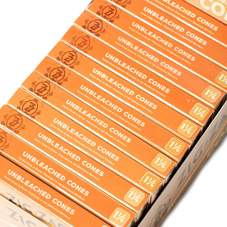Pre Rolled Unbleached 1 1/4 Paper Cones - Pack of 6 in a branded, crush-proof box, emphasizing convenience and quality for easy, smooth use.