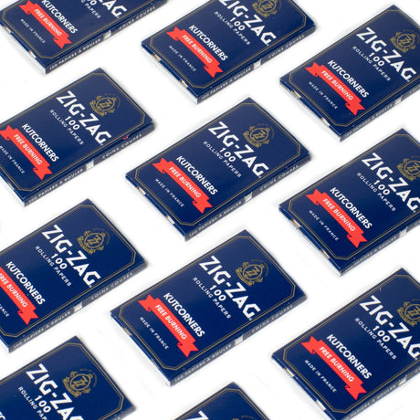 Single Wide Blue Rolling Paper, featuring compact blue packages and white text, showcasing easy-to-roll, fast-burning papers made from natural flax plant fibers.