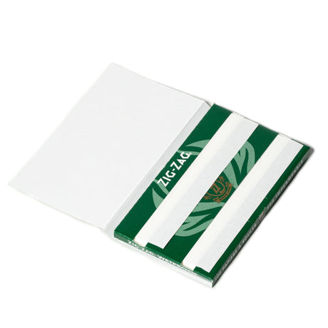 Single Wide Green Rolling Paper box featuring a green and white design, highlighting its wetproof, slow-burning qualities with 70mm x 38mm natural flax fibers.