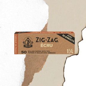 Unbleached 1 1/4 Papers & Tips in a brown box with black text, featuring ultra-thin, slow-burning rolling papers and tips, ideal for natural, seamless rolling.